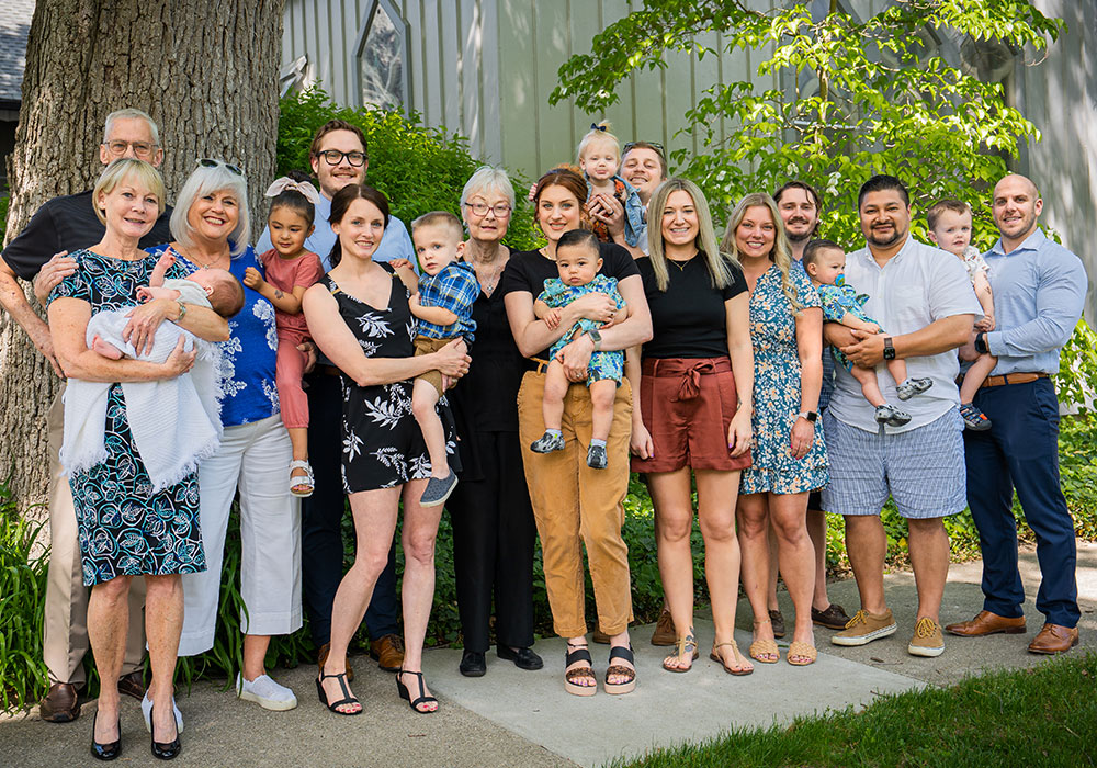 A large multigenerational church group poses together